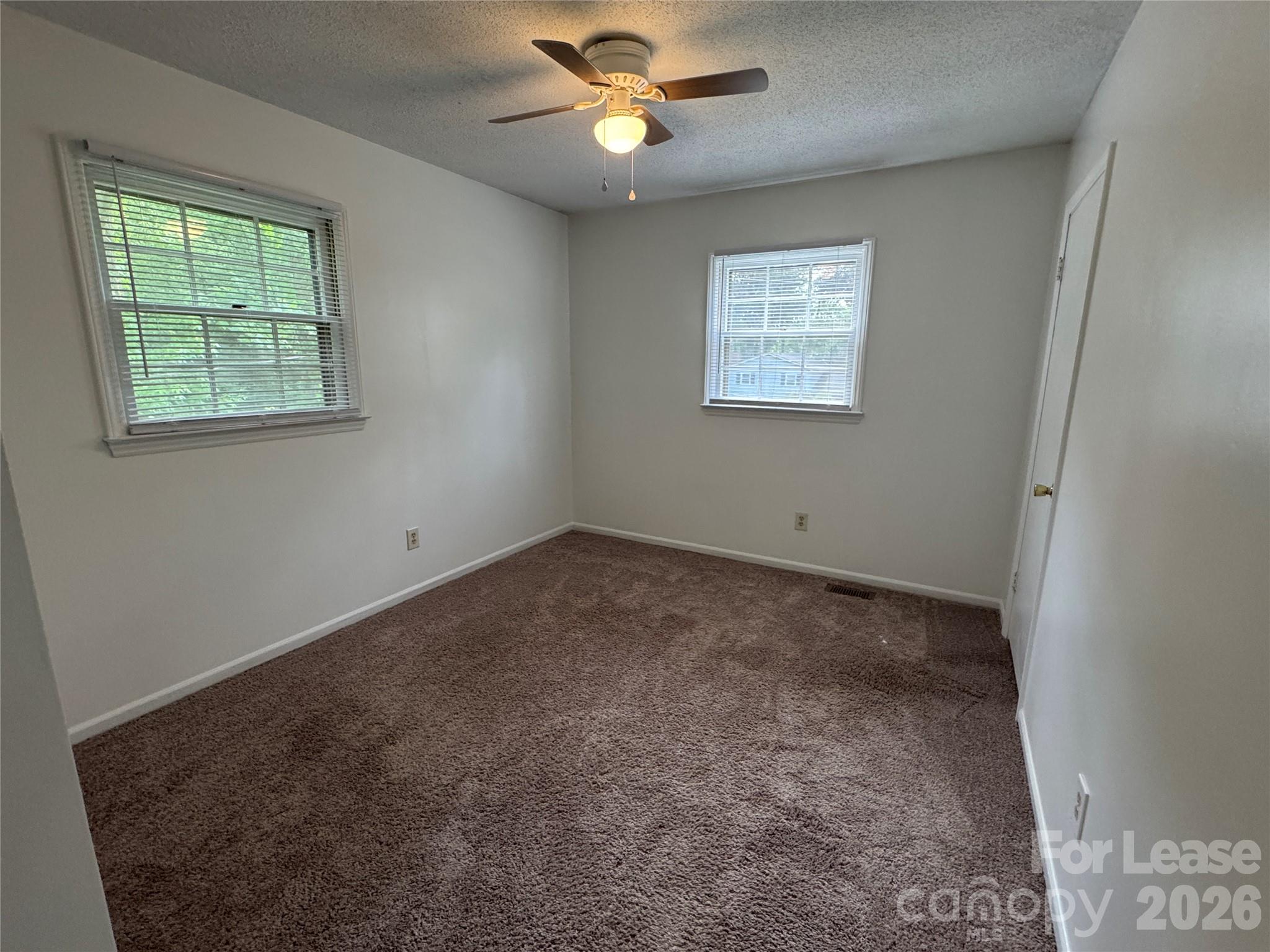 315 Pine Road Mount Holly, NC 28120 - Photo 11 of 21 a view of an empty room with a window