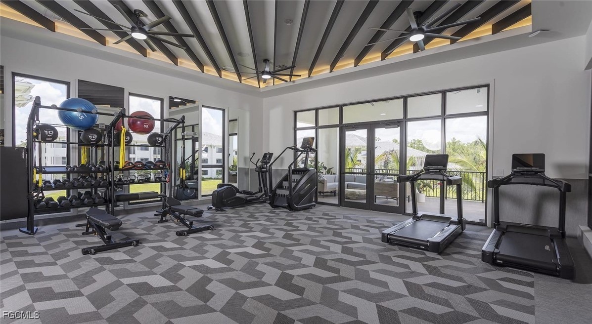 7301 Lake Bank Loop, Unit AMITY Fort Myers, FL 33966 - Photo 8 of 27 a view of a room with gym equipment