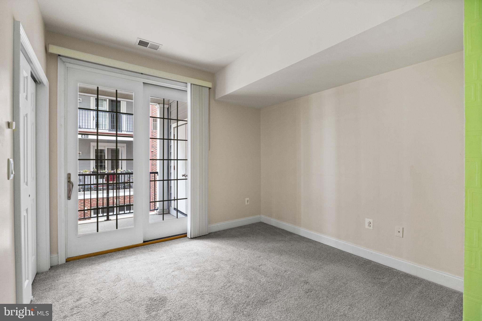 201 Commodore Court Philadelphia, PA 19146 - Photo 35 of 61 a view of an empty room with a window