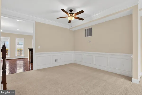 a view of a hallway with entryway door