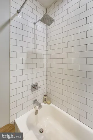 a bathroom with a sink and a shower