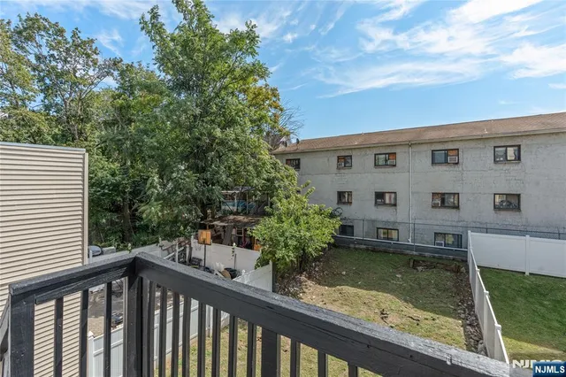 a view of a house with a swimming pool