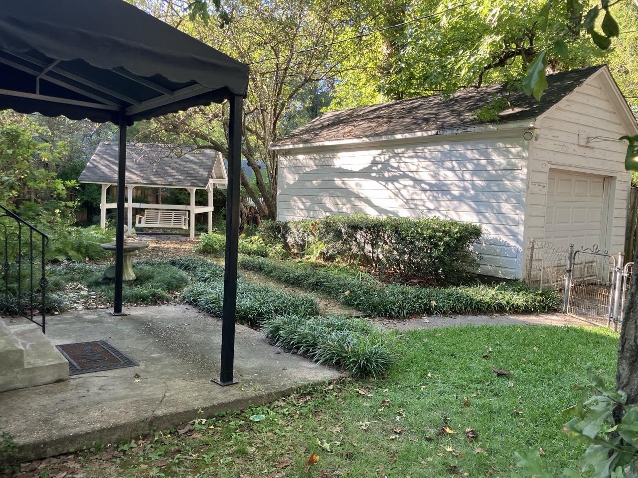3706 Rhea Avenue Memphis, TN 38122 - Photo 20 of 21 a view of a house with backyard and garden