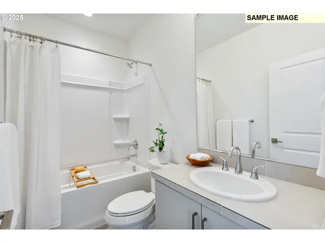 a hallway with a view of living room