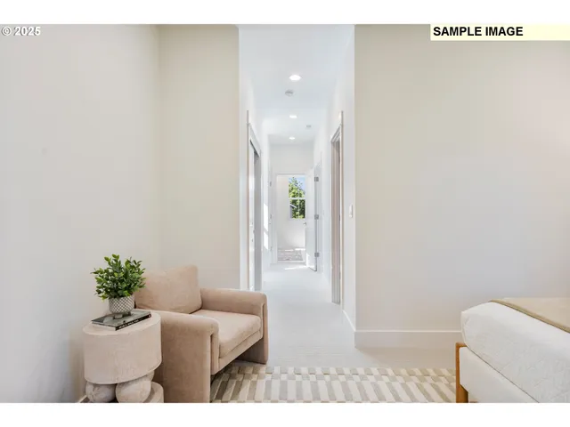 a kitchen with kitchen island a sink appliances and cabinets