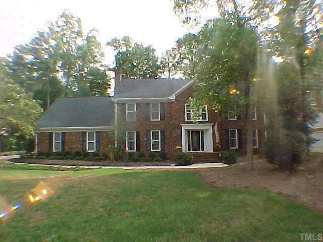 7001 North Ridge Drive Raleigh, NC 27615 - Photo 1 of 1 front view of a house with a yard