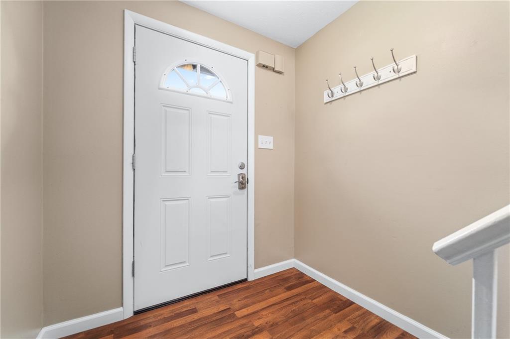 310 Ridge Point Circle Bridgeville, PA 15017 - Photo 3 of 20 a view of empty room with wooden floor