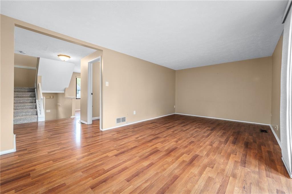 310 Ridge Point Circle Bridgeville, PA 15017 - Photo 8 of 20 a view of empty room with wooden floor