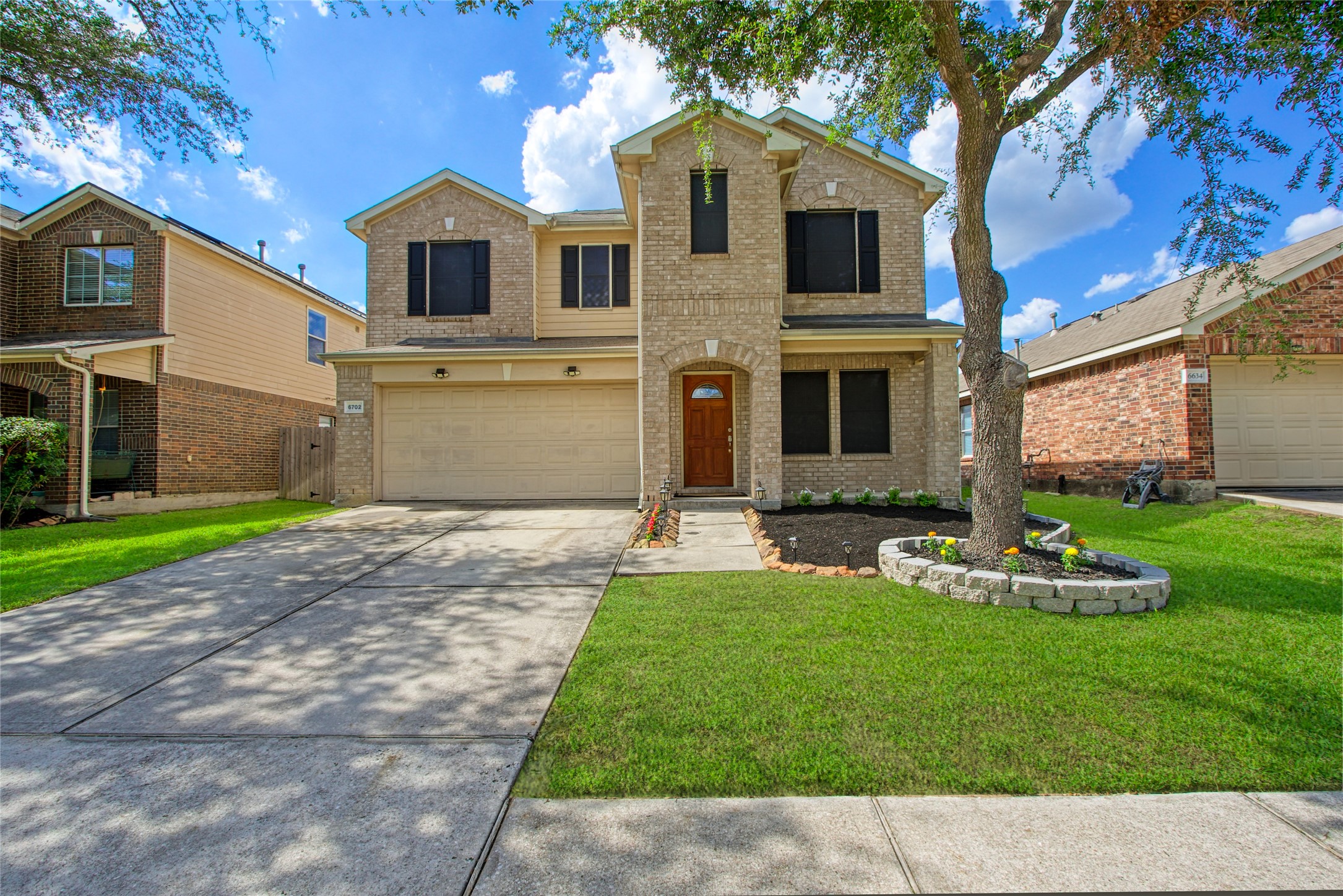 6702 Northridge Trace Lane Spring, TX 77379 - Photo 3 of 30 a front view of a house with a yard