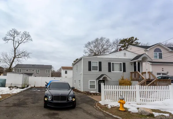 a car parked in front of a house