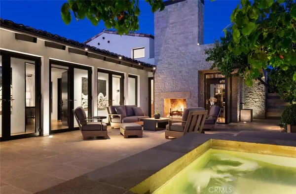 a view of swimming pool with seating space