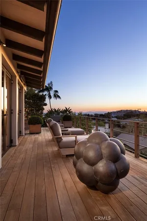 a view of roof deck with seating space