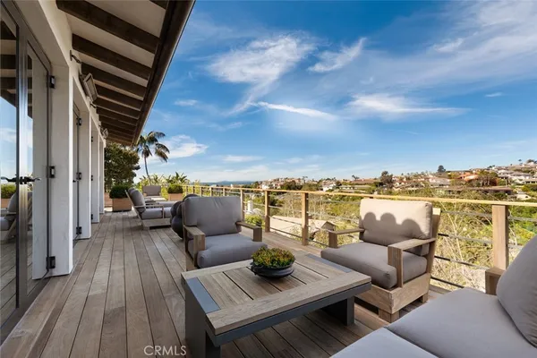 a view of a roof deck with couches
