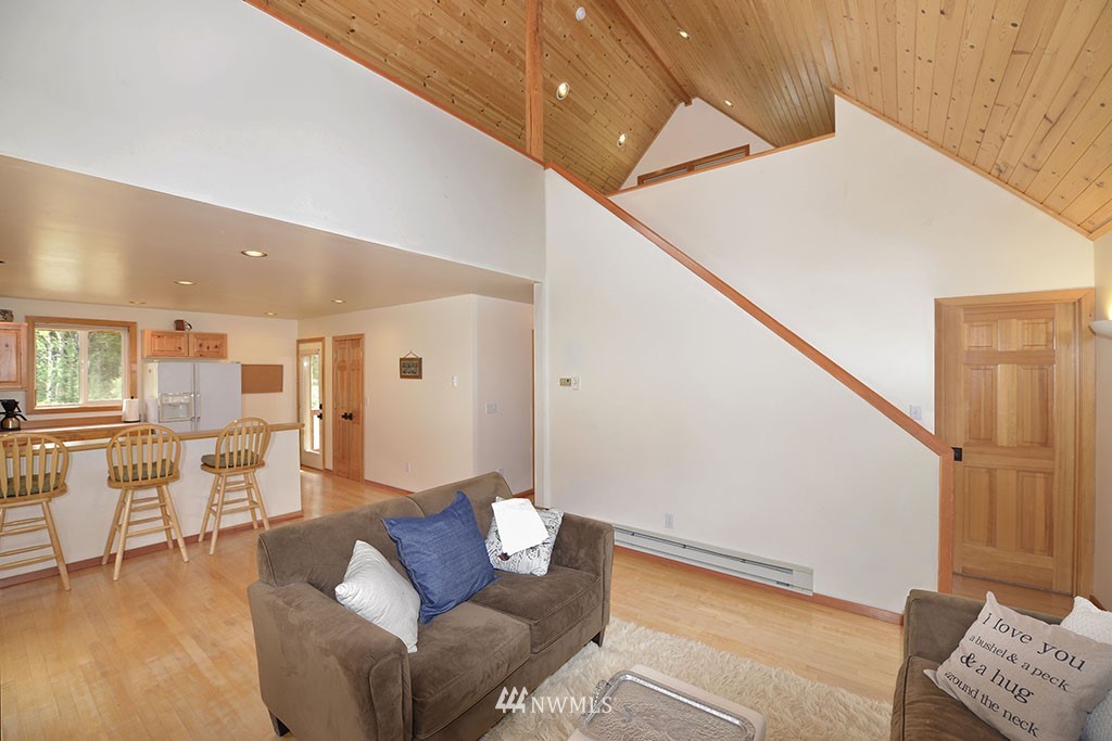 71 Homestead Road Winthrop, WA 98862 - Photo 14 of 25 a living room with furniture and wooden floor