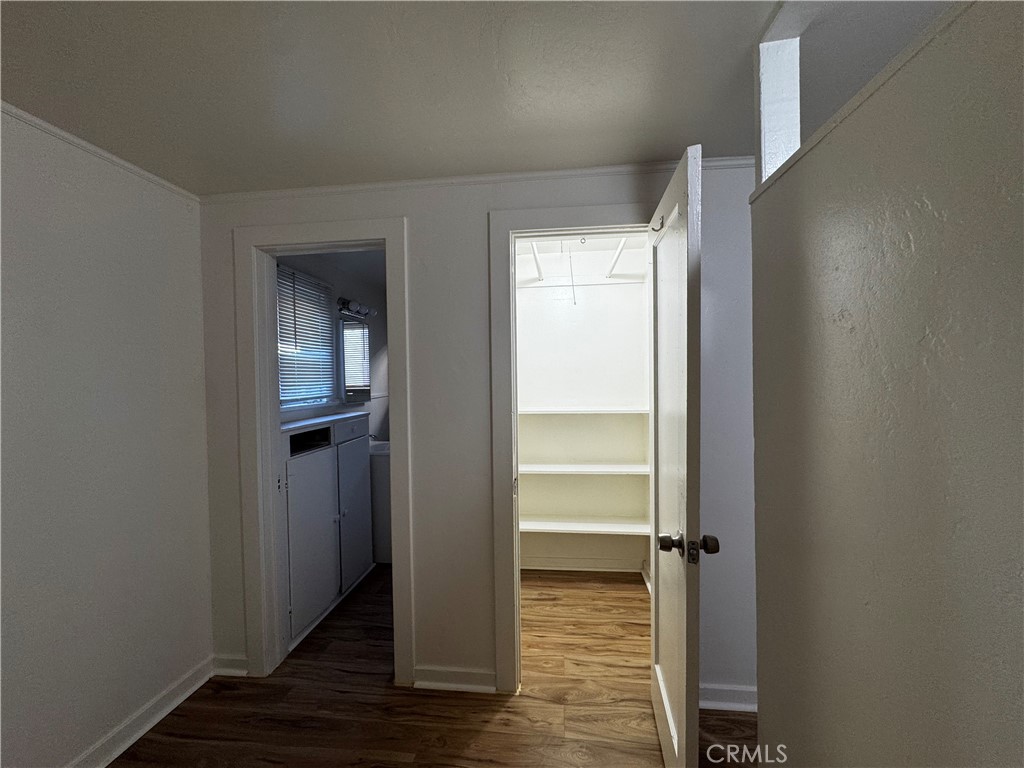 2726 5th Street, Unit 4 Riverside, CA 92507 - Photo 9 of 12 a view of front door with wooden floor
