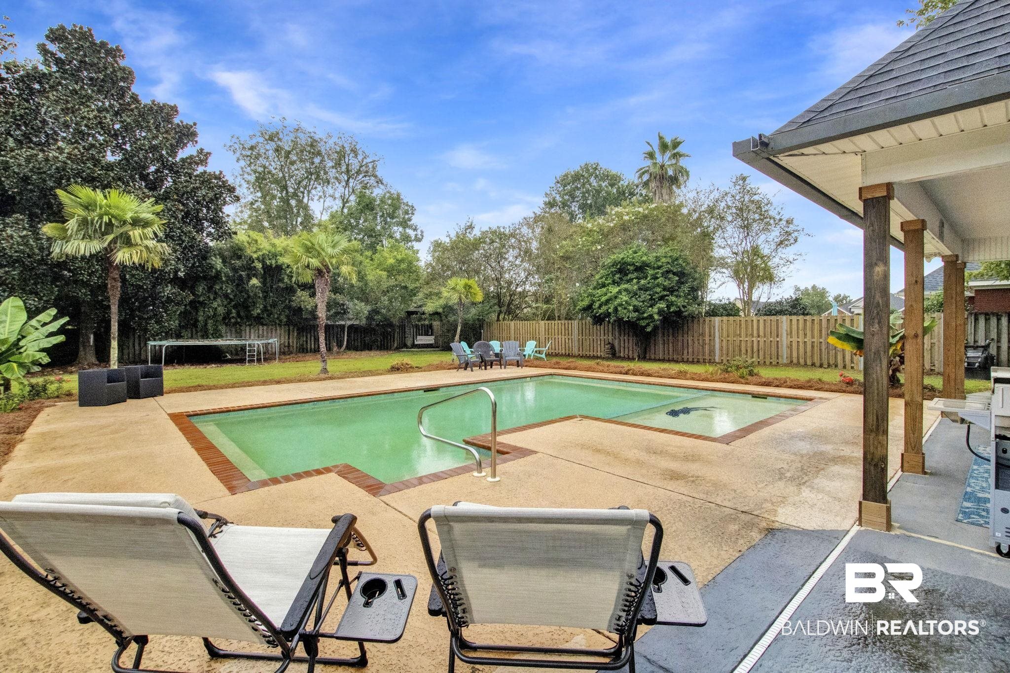 9002 Parliament Circle Daphne, AL 36526 - Photo 66 of 73 View of swimming pool featuring a patio area
