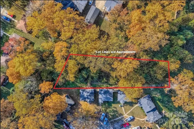 a view of a balcony with floor to ceiling windows with wooden floor