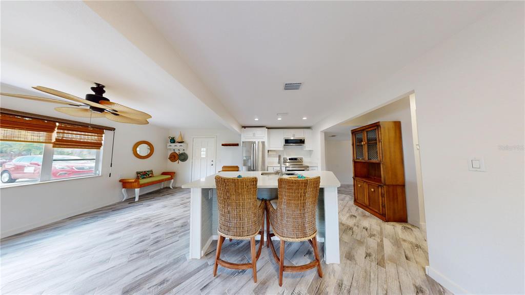 6057 Florida Street Punta Gorda, FL 33950 - Photo 12 of 29 a view of a dining room with furniture and window