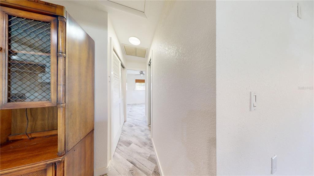 6057 Florida Street Punta Gorda, FL 33950 - Photo 16 of 29 a view of a bathroom from a hallway