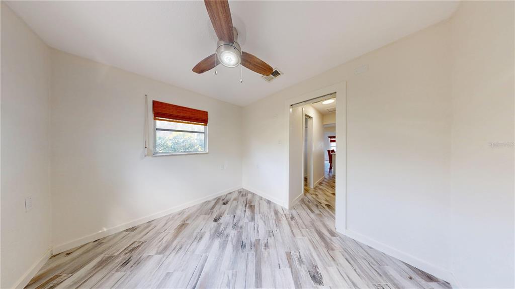 6057 Florida Street Punta Gorda, FL 33950 - Photo 19 of 29 a view of hallway with wooden floor