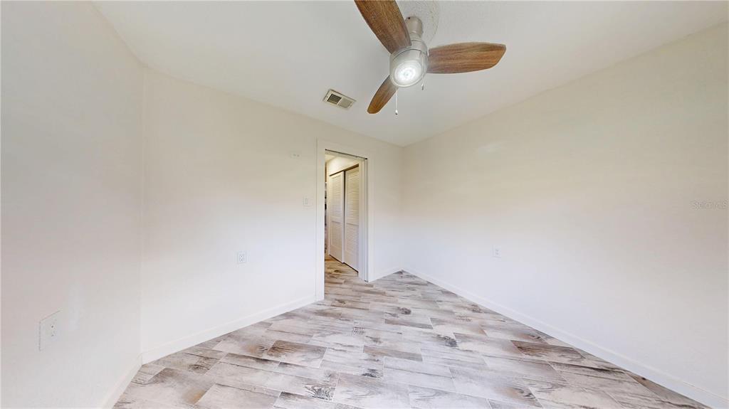 6057 Florida Street Punta Gorda, FL 33950 - Photo 20 of 29 a view of a hallway with entryway