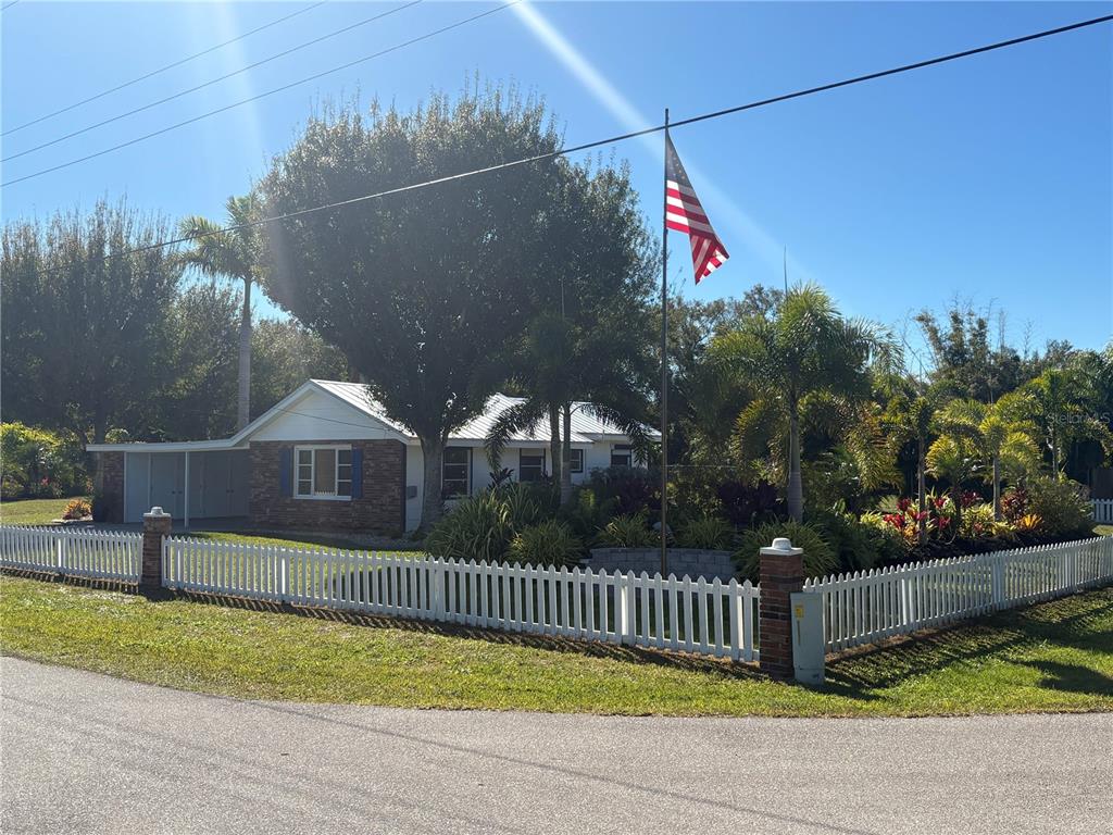 6057 Florida Street Punta Gorda, FL 33950 - Photo 3 of 29 a view of a street with a park