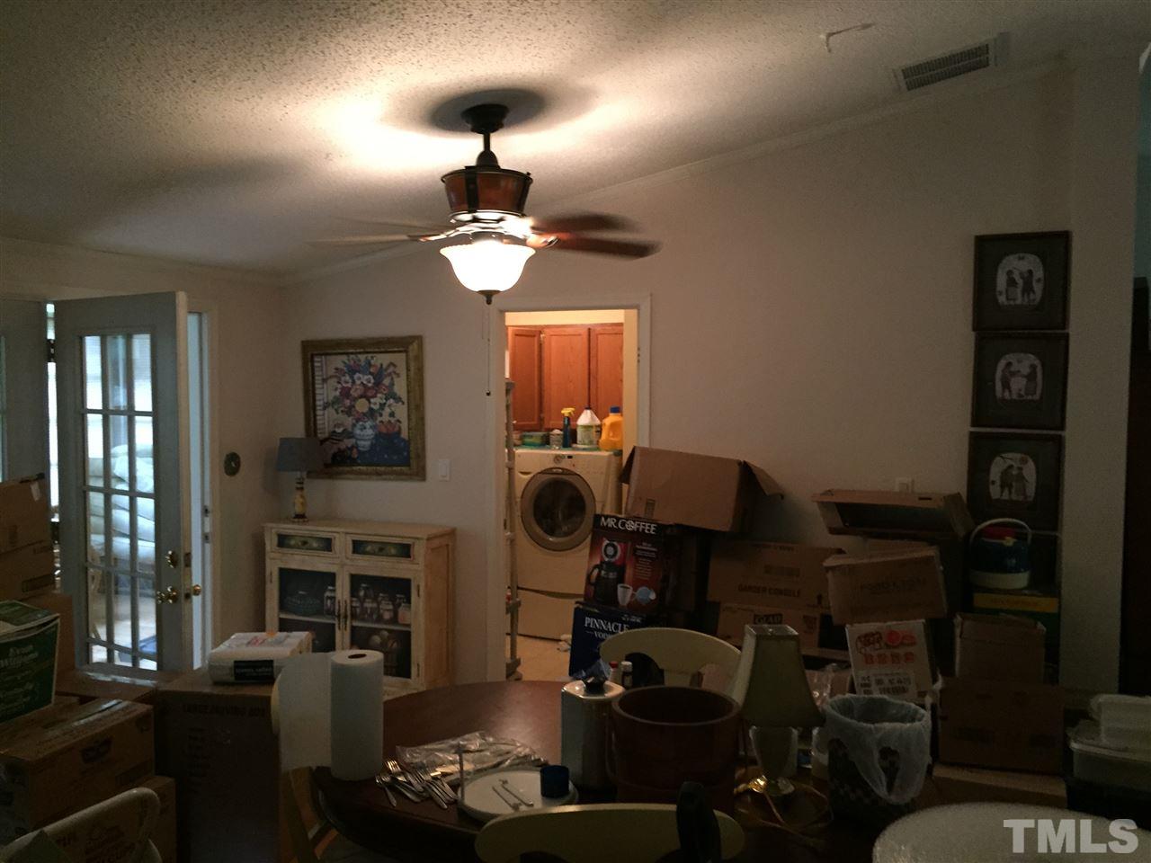 1136 Holeman Ashley Road Timberlake, NC 27583 - Photo 12 of 20 a view of a workspace with furniture