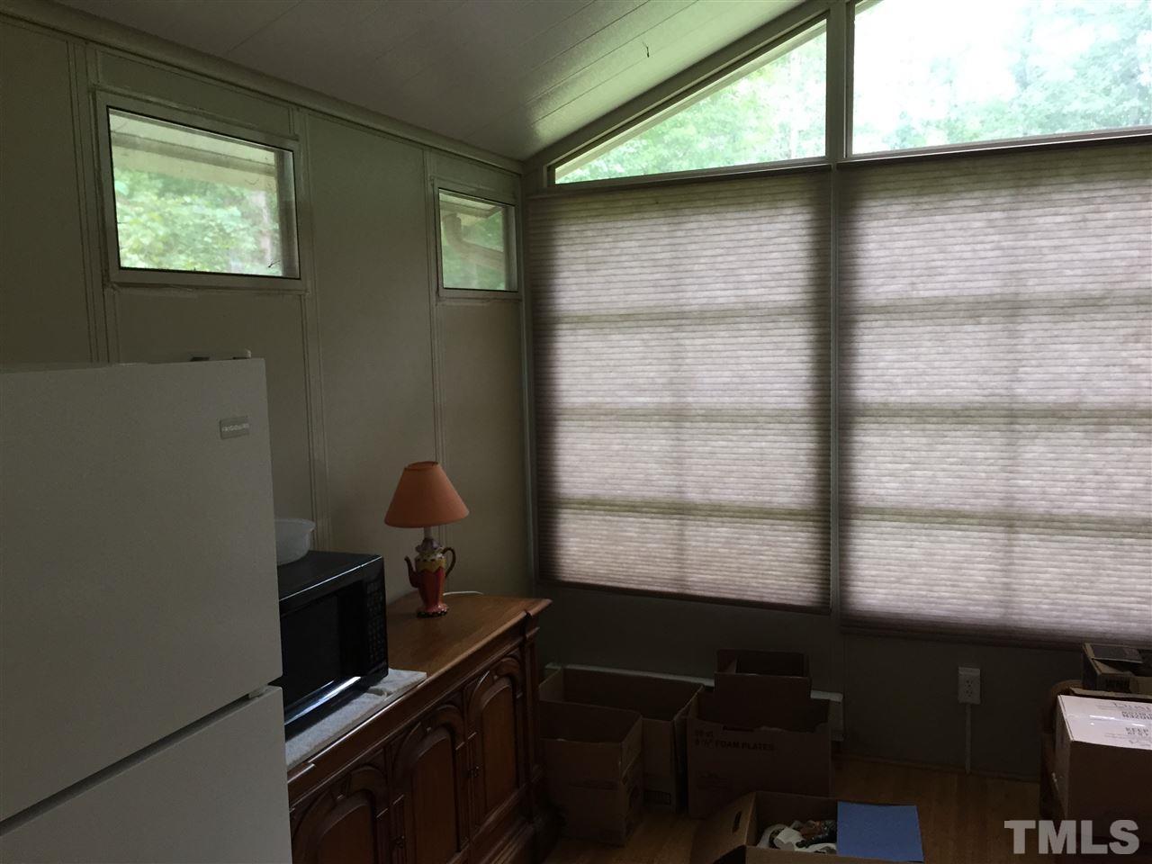 1136 Holeman Ashley Road Timberlake, NC 27583 - Photo 15 of 20 a room with a window