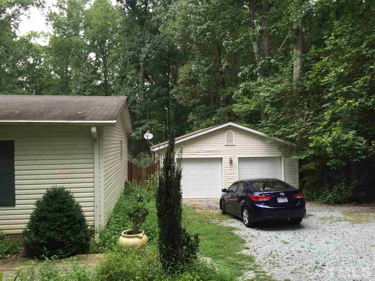 1136 Holeman Ashley Road Timberlake, NC 27583 - Photo 3 of 20 a car parked in front of a house