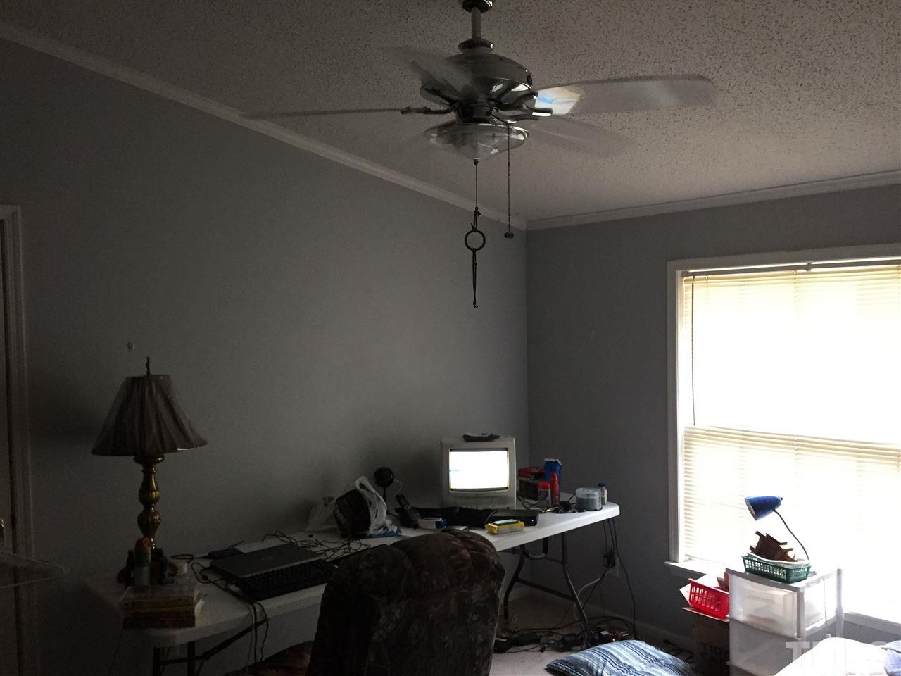 1136 Holeman Ashley Road Timberlake, NC 27583 - Photo 5 of 20 a room with a window