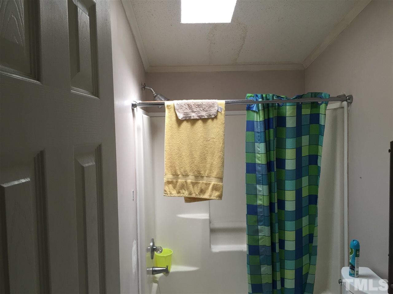 1136 Holeman Ashley Road Timberlake, NC 27583 - Photo 6 of 20 a bathroom with a shower
