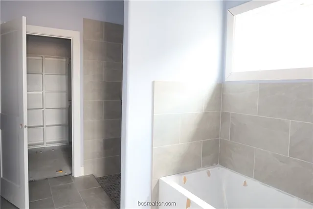 a bathroom with a bathtub