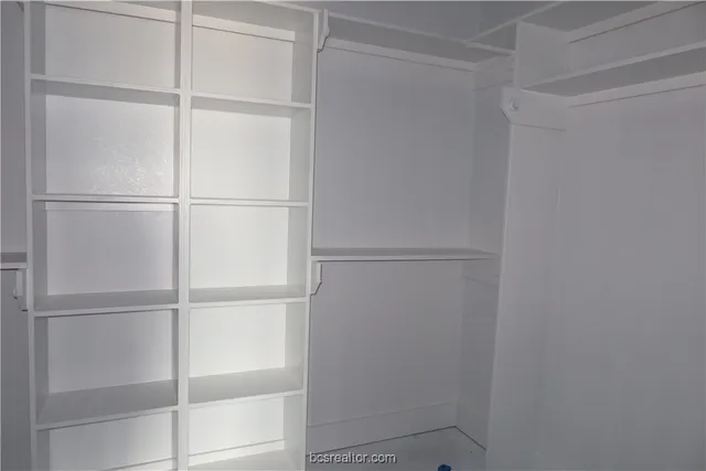 a view of a room with rack on the wall