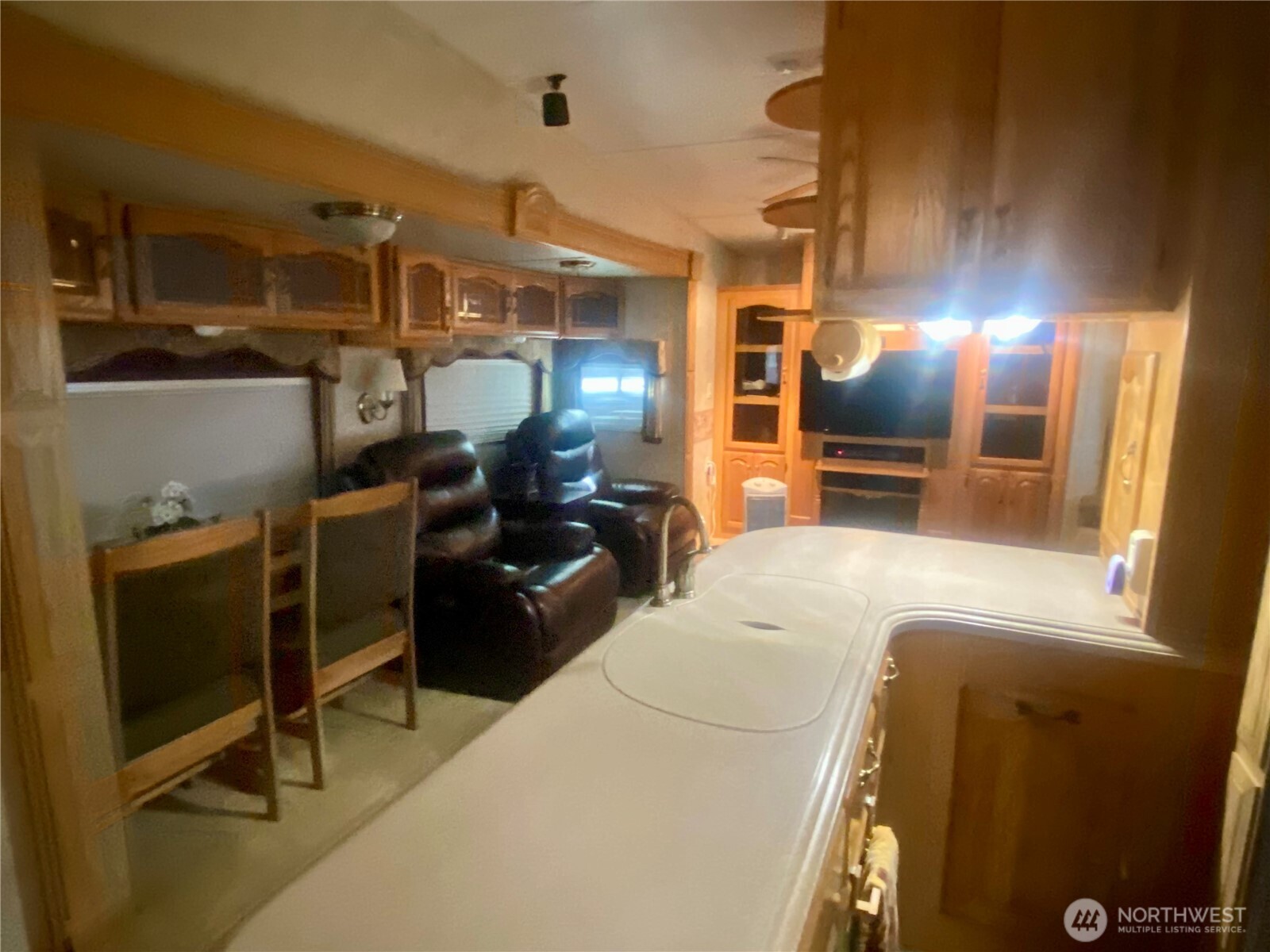 393 Tom And Nita Road Cle Elum, WA 98922 - Photo 11 of 30 a bed room with a bed and a television