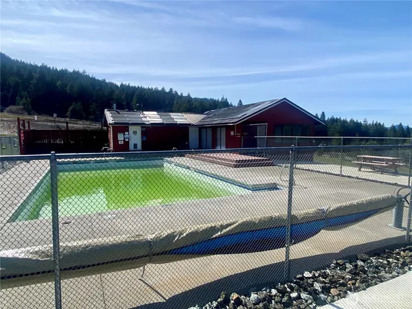 a view of a lake with a city