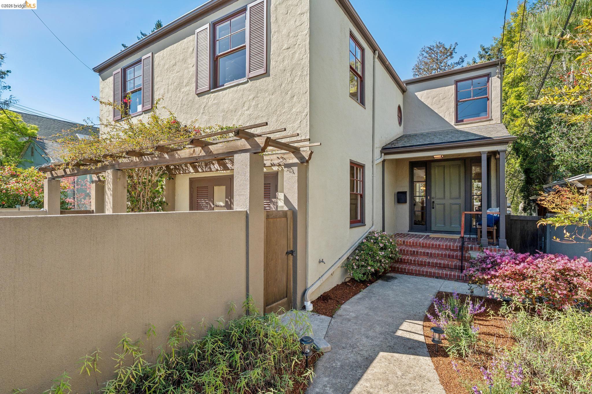 1412 Oxford Street Berkeley, CA 94709 - Photo 1 of 1 a front view of a house with garden