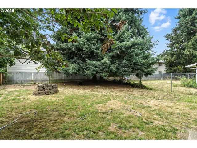 a view of swimming pool with a yard