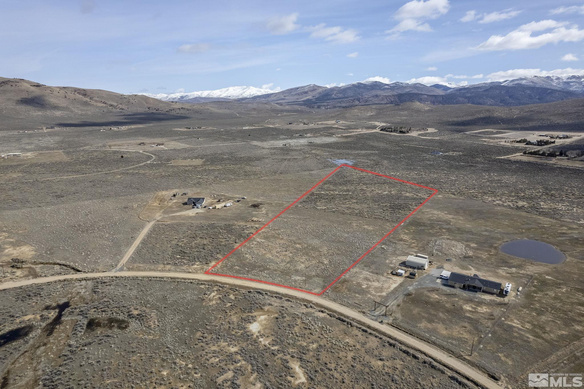 115 Buckboard Circle Reno, NV 89508 - Photo 1 of 17 a view of a backyard of a house