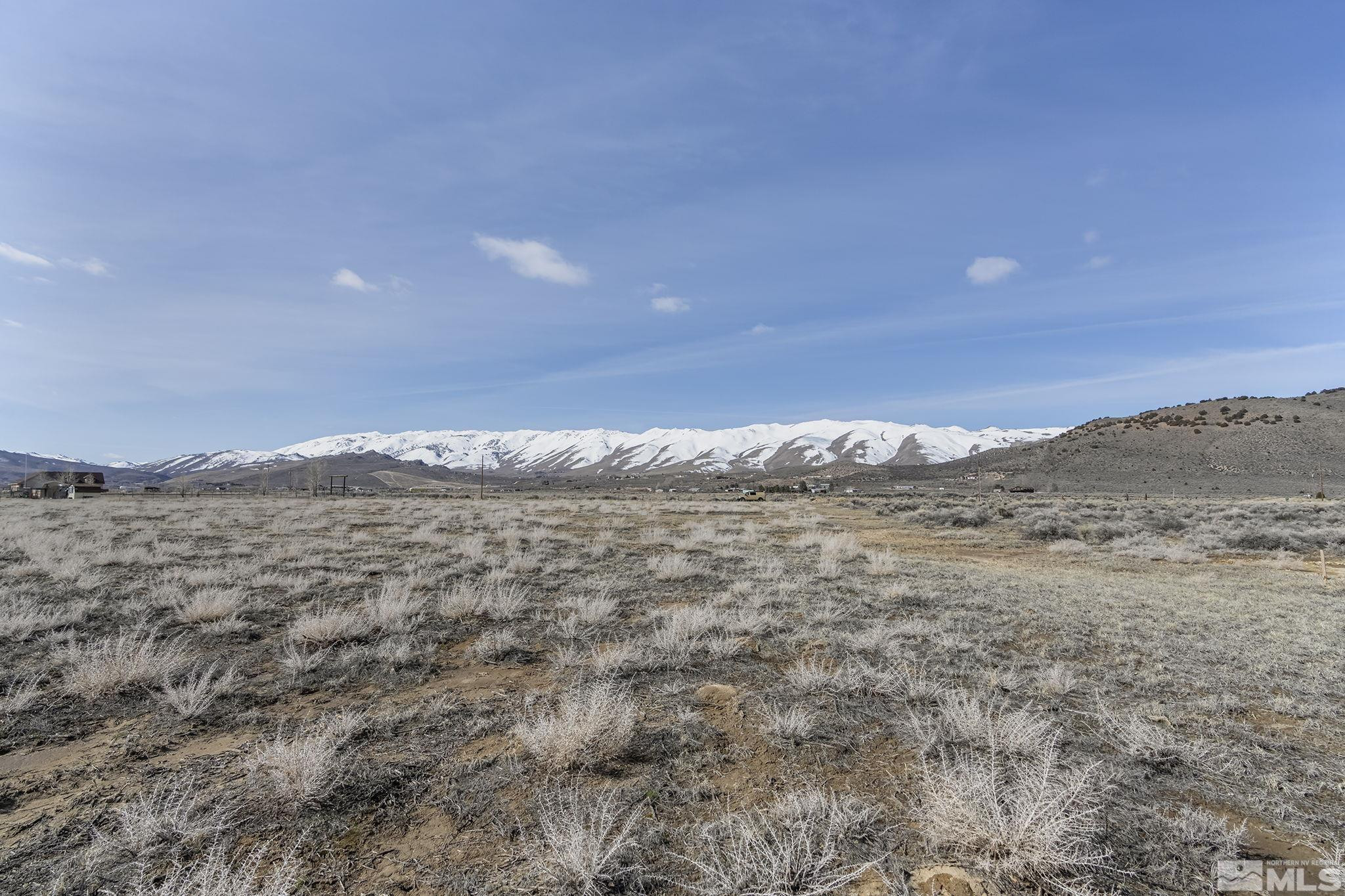 115 Buckboard Circle Reno, NV 89508 - Photo 15 of 17 a view of mountain with sunset in background