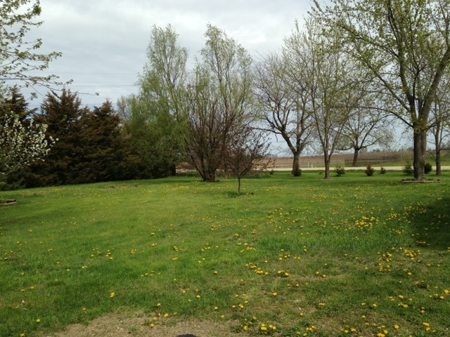 1192 Corregidor Road Amboy, IL 61310 - Photo 3 of 4 a view of grassy field with benches