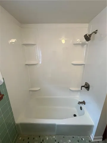 a bathroom with a bathtub