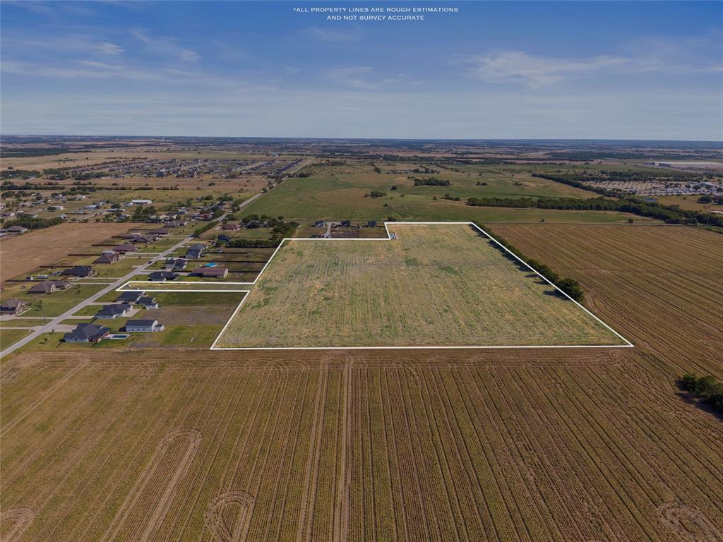 3885 Lois Road West Sanger, TX 76266 - Photo 3 of 12 Expansive land parcel with surrounding agricultural fields