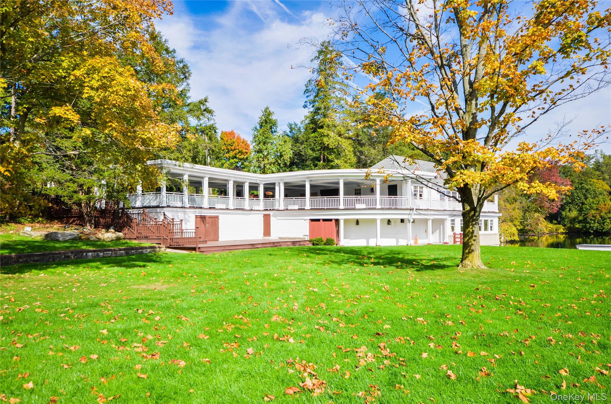 65 Windmill Road Armonk, NY 10504 - Photo 36 of 37 a house view with a garden space