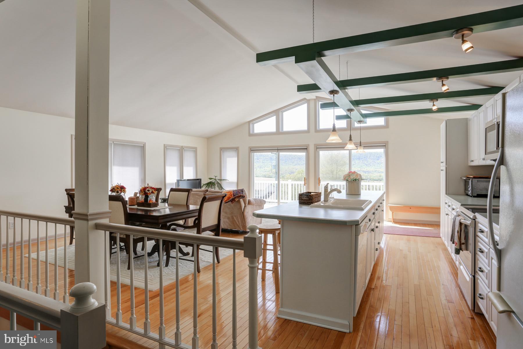 680 Powells Valley Road Halifax, PA 17032 - Photo 11 of 44 a view of a dining room with furniture window and wooden floor