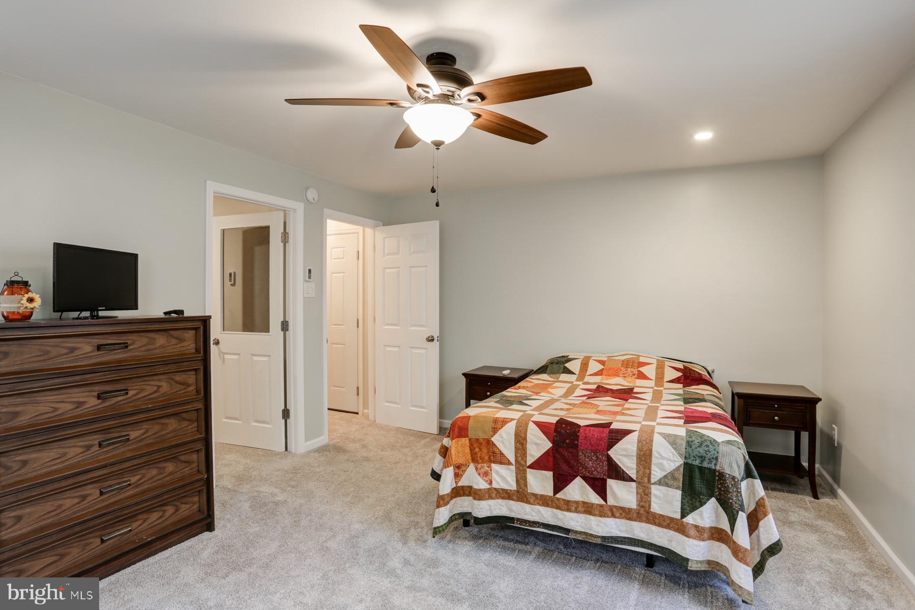 680 Powells Valley Road Halifax, PA 17032 - Photo 21 of 44 a bedroom with a bed and a tv