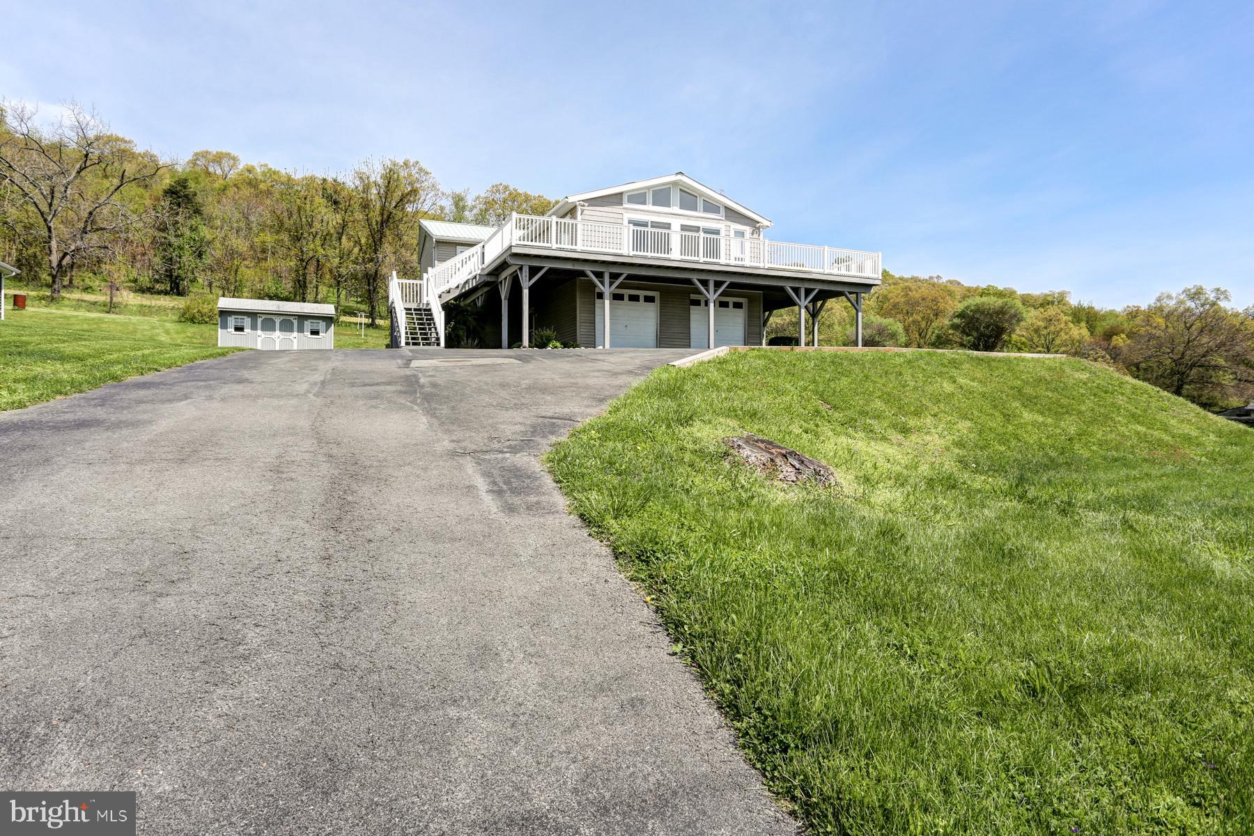 680 Powells Valley Road Halifax, PA 17032 - Photo 36 of 44 a front view of a house with a yard