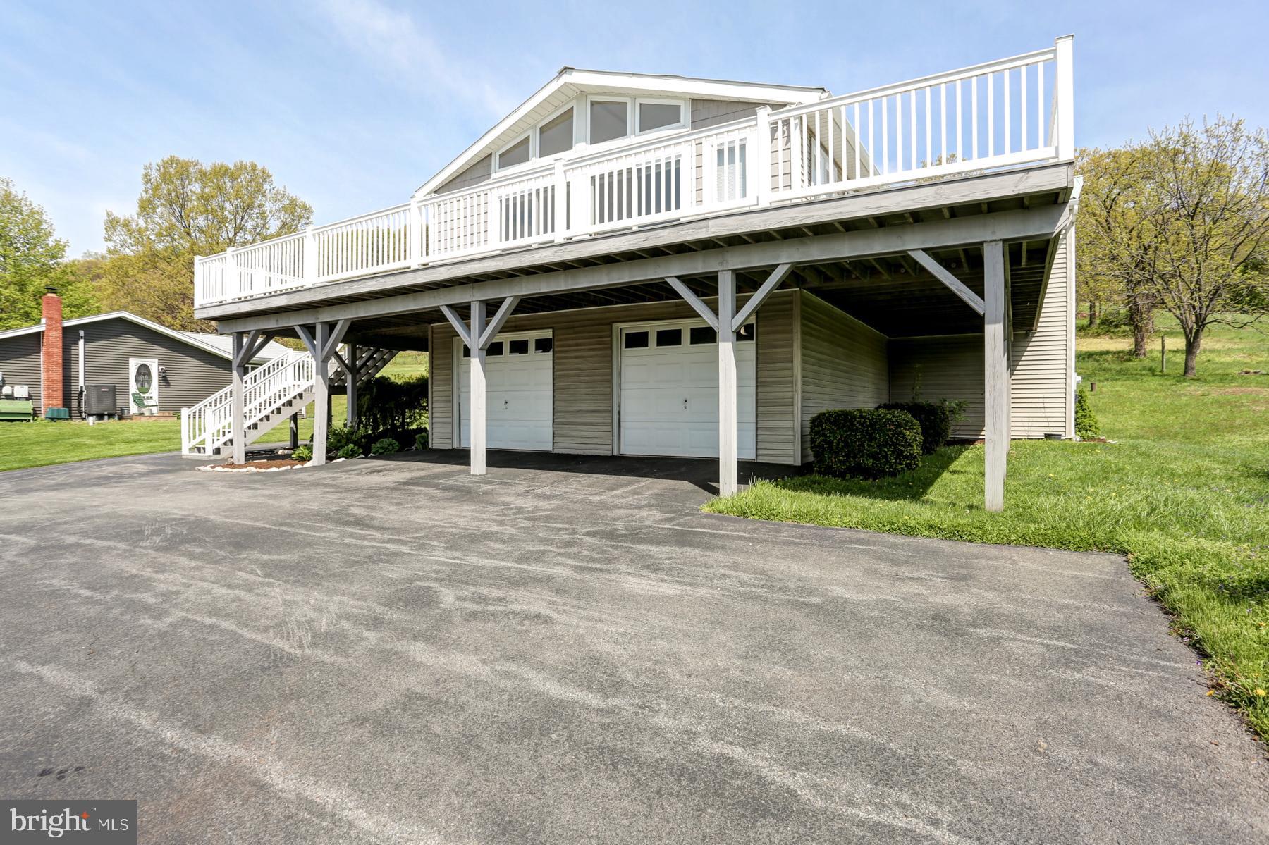680 Powells Valley Road Halifax, PA 17032 - Photo 40 of 44 a front view of a house with garden