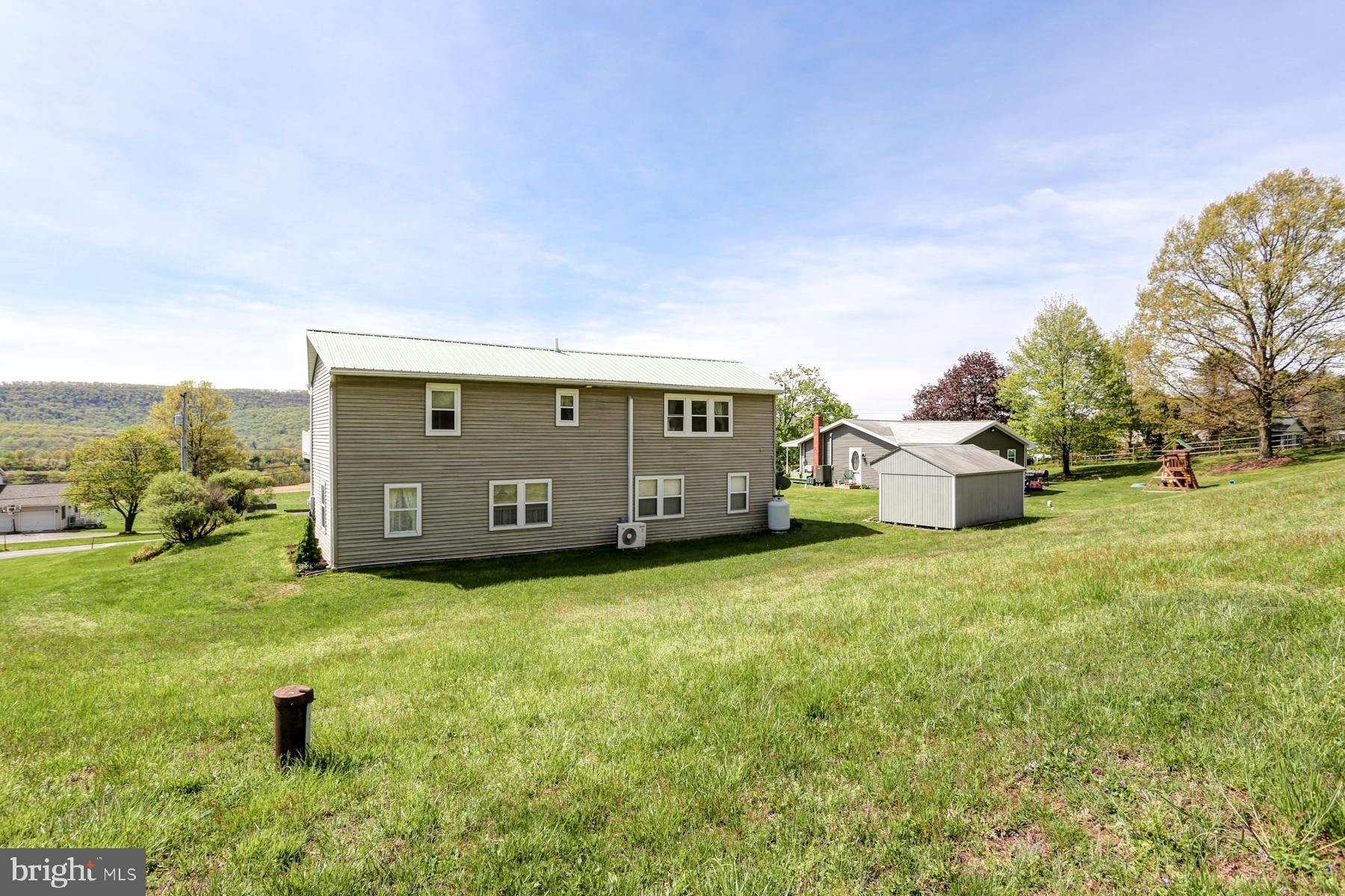 680 Powells Valley Road Halifax, PA 17032 - Photo 42 of 44 a house view with a garden space