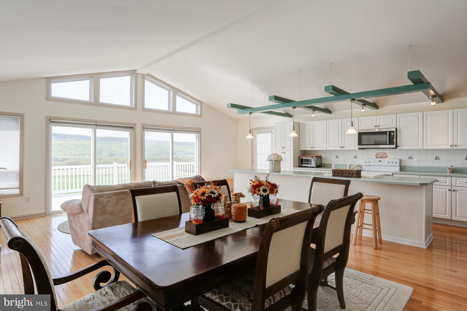 680 Powells Valley Road Halifax, PA 17032 - Photo 8 of 44 a view of a dining room with furniture window and wooden floor
