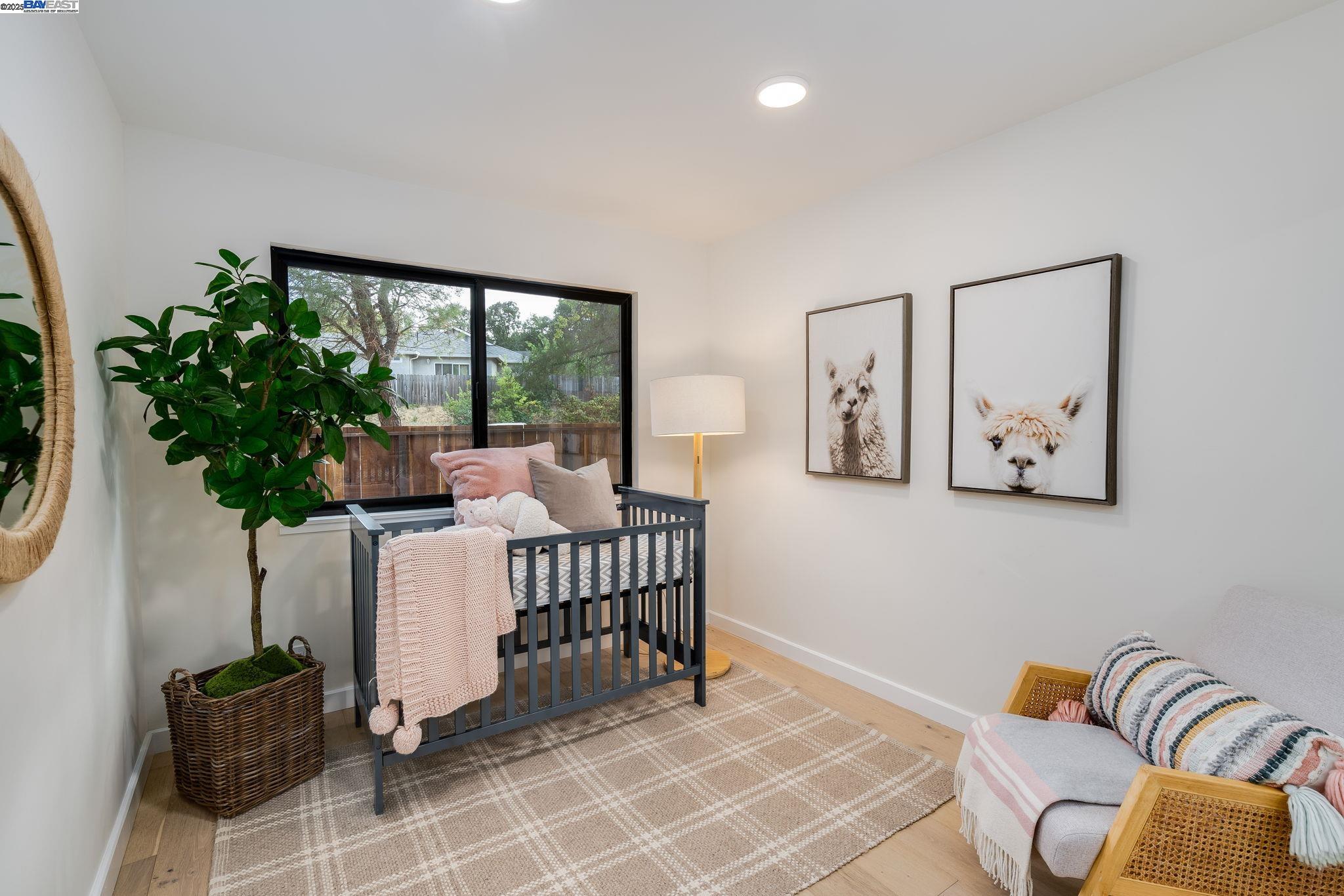 1425 Camino Verde Walnut Creek, CA 94597 - Photo 13 of 28 a living room with furniture a potted plant and a large window